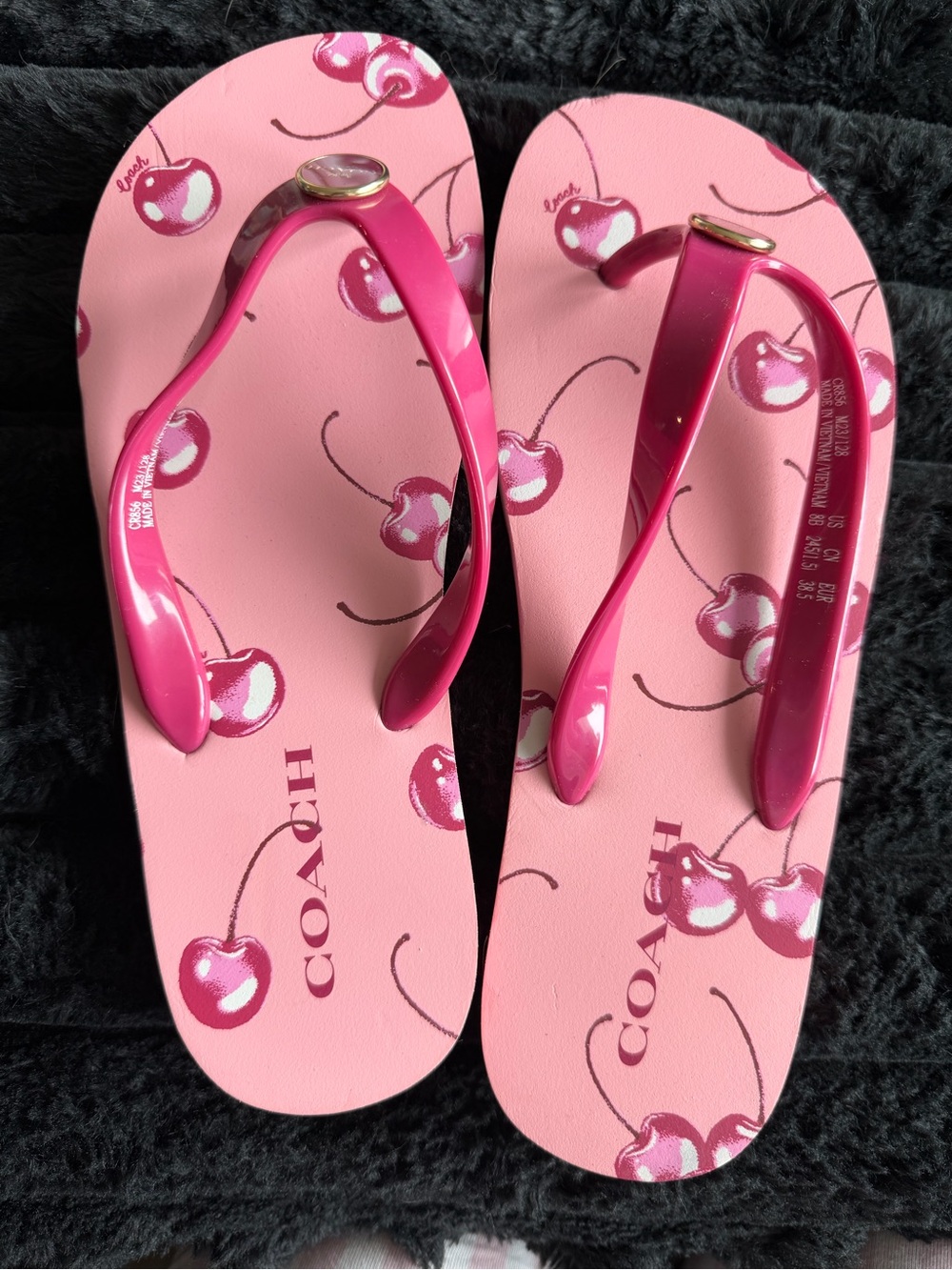 Coach Zayn flip-flops in a pink cherry print Size 8